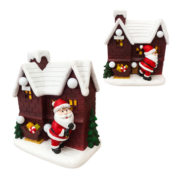 Domek świąteczny ceramiczny LED 21 cm figurka z Mikołajem na baterie