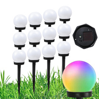 Lampa ogrodowa wbijana LED SOLARNA KULA BIAŁA RGB 10 cm 12 szt